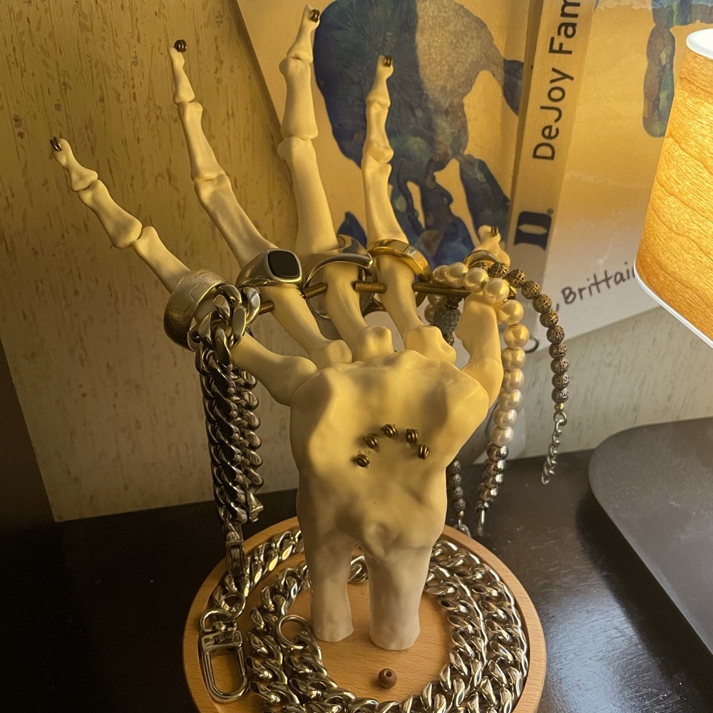 Skeleton hand jewelry stand